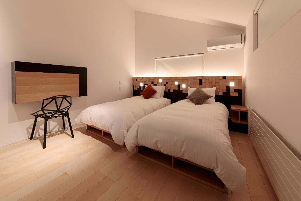 Condominium Ishitei Furano Bagian luar foto