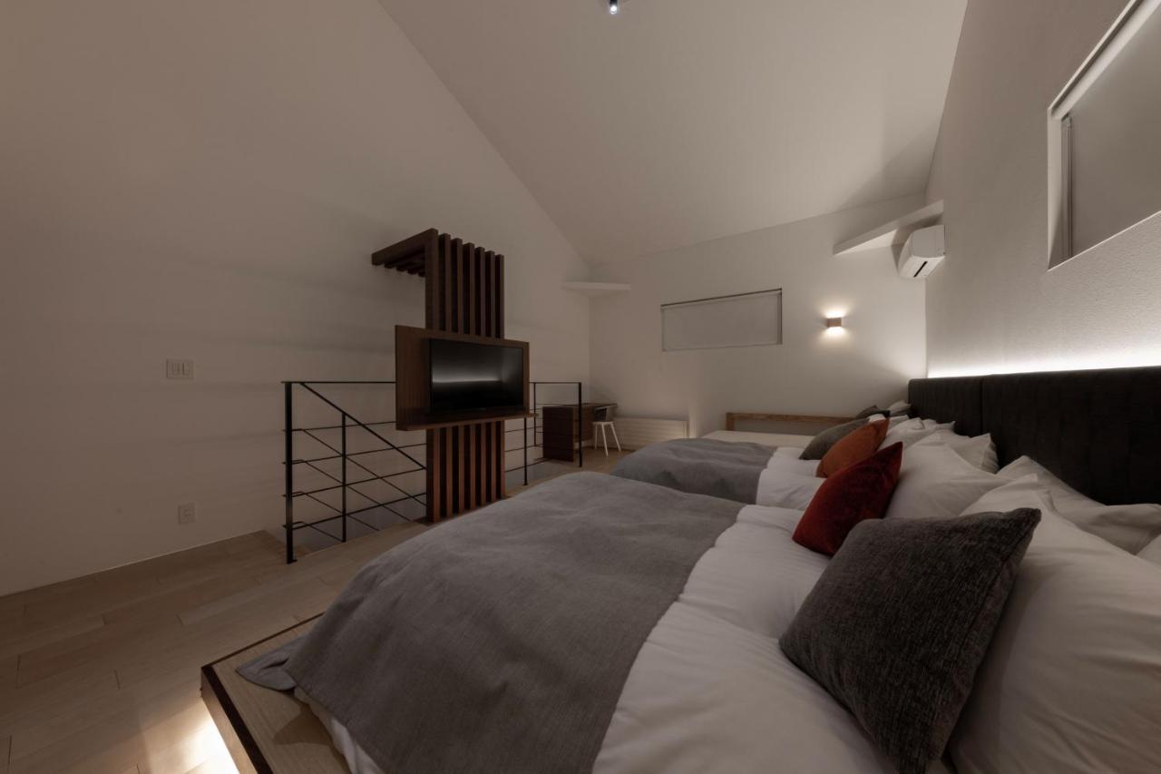 Condominium Ishitei Furano Bagian luar foto