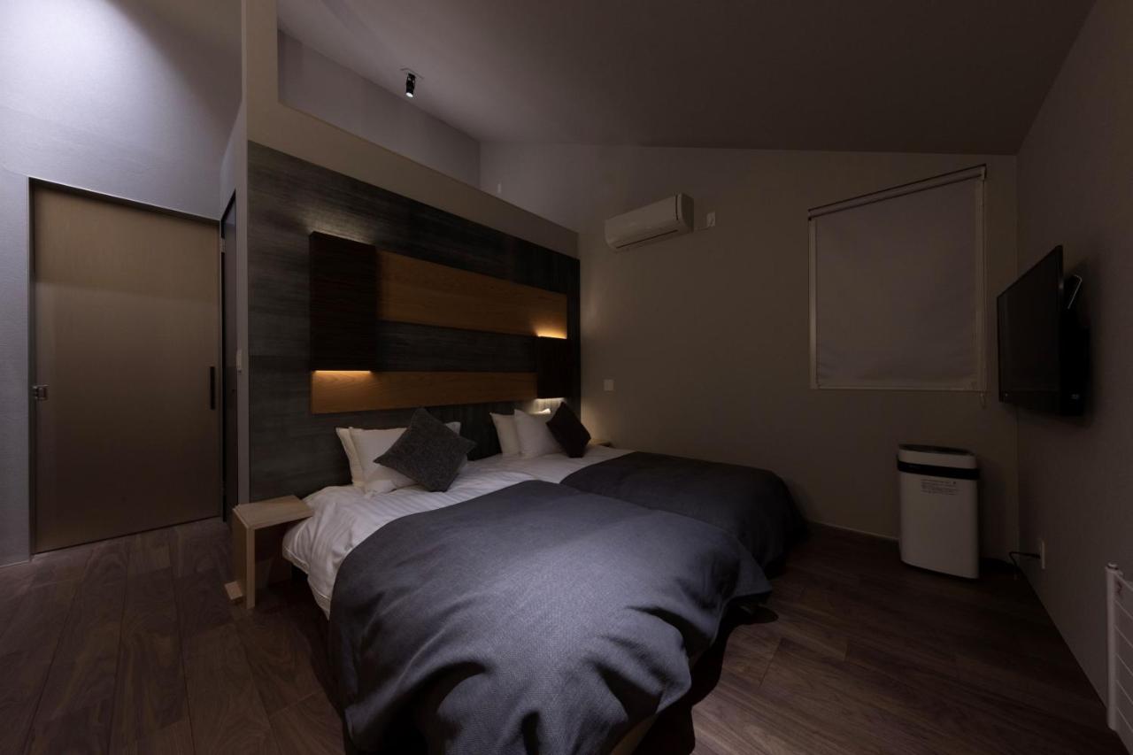 Condominium Ishitei Furano Bagian luar foto